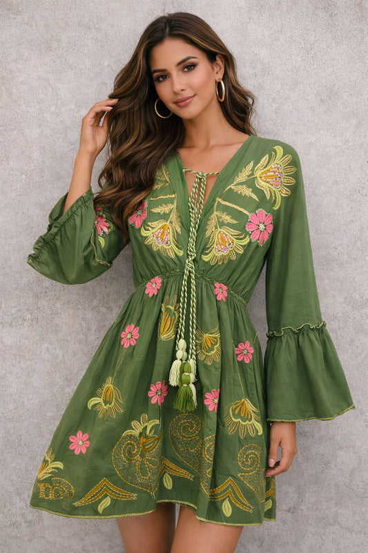 Short dress with embellished sleeves