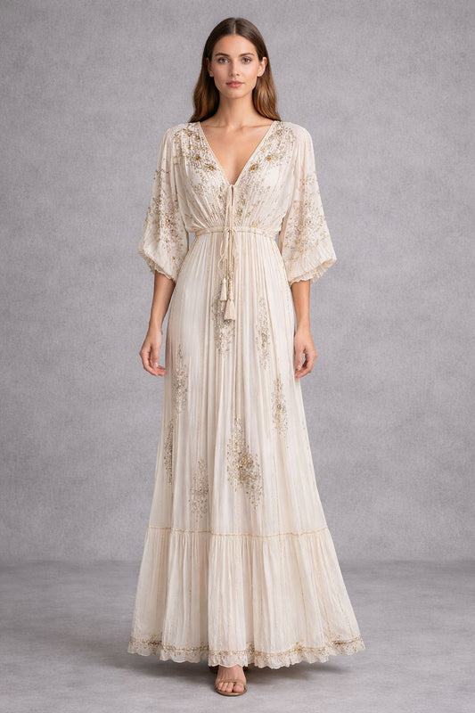 Maxi dress in a bohemian style with short sleeves and embellishments