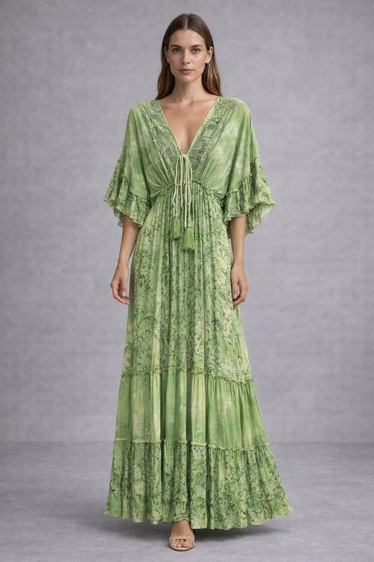 Bohemian-style maxi dress with short sleeves and embellishments