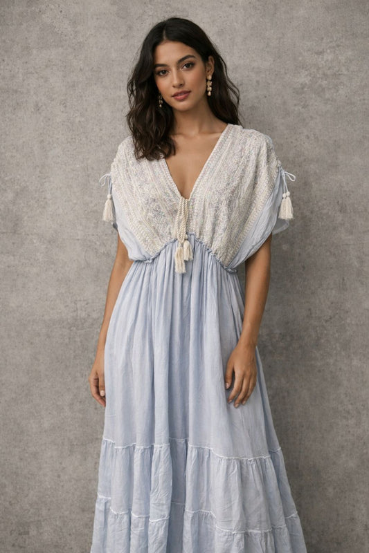 Bohemian-style maxi dress with short sleeves and embellishments