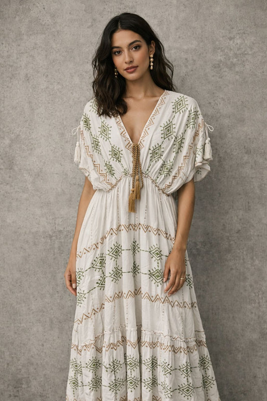 Bohemian-style maxi dress with short sleeves and embellishments