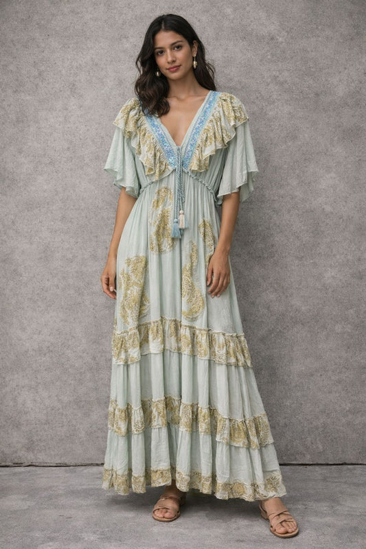 Bohemian-style maxi dress with short sleeves and embellishments