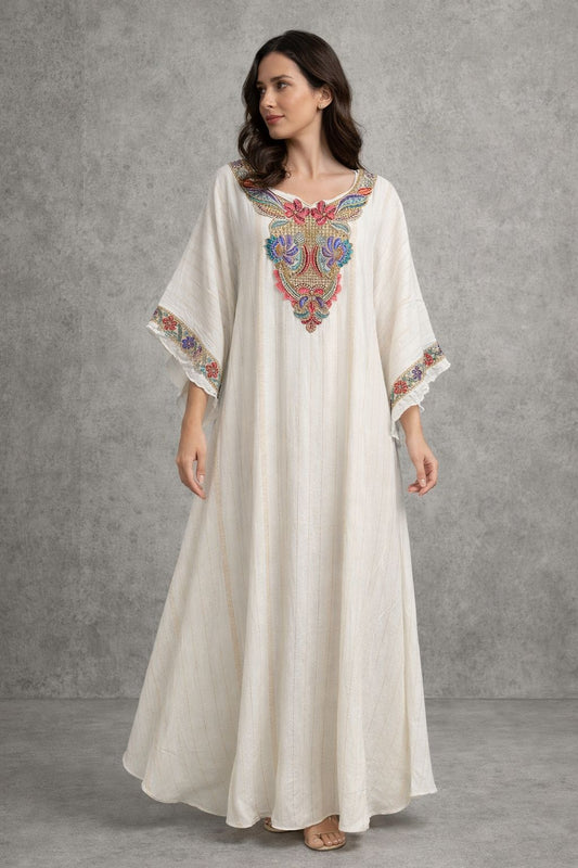 Poncho dress with embellishments