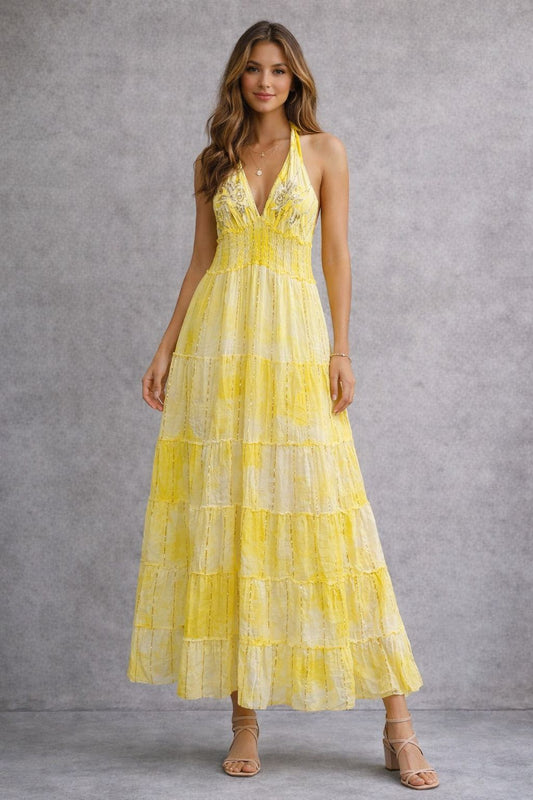 Sleeveless dress with embellishments