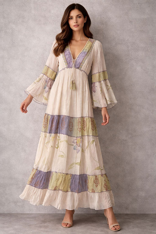 Maxi dress with long sleeves and embellishments